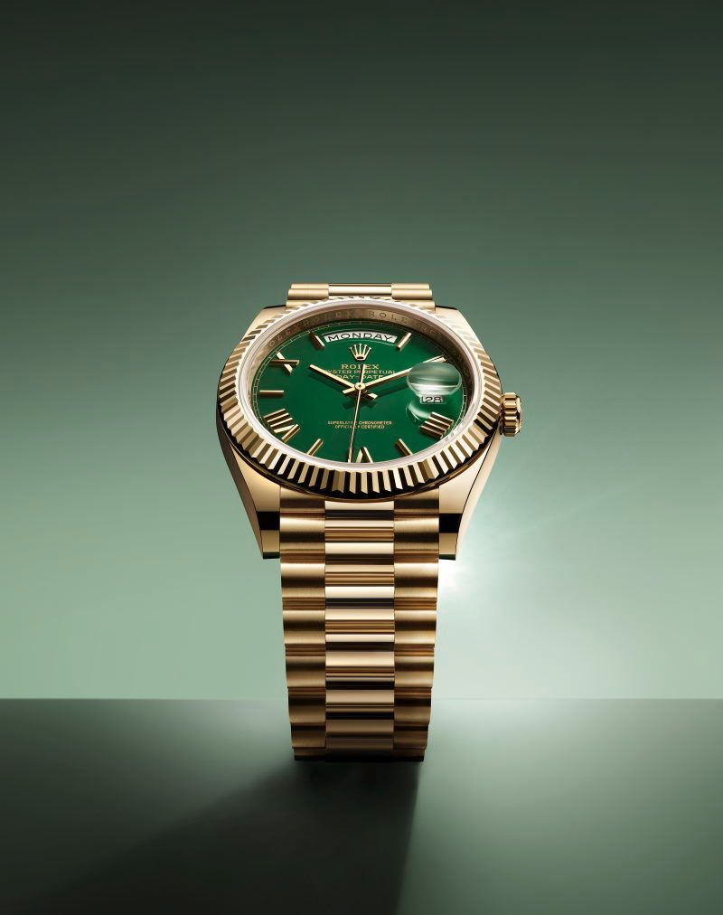 Rolex oyster perpetual on sale day date gold