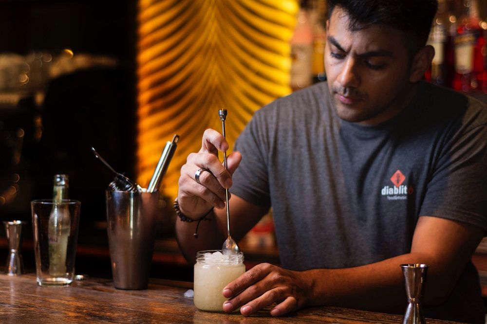 stir or shake a cocktail