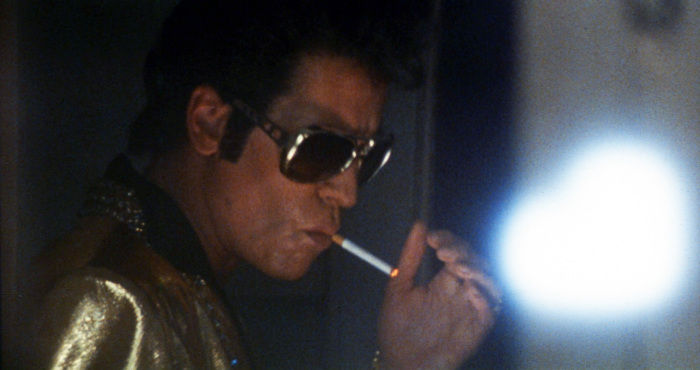 did elvis presley smoke cigarettes smoked Elvis Presley impersonator walking along