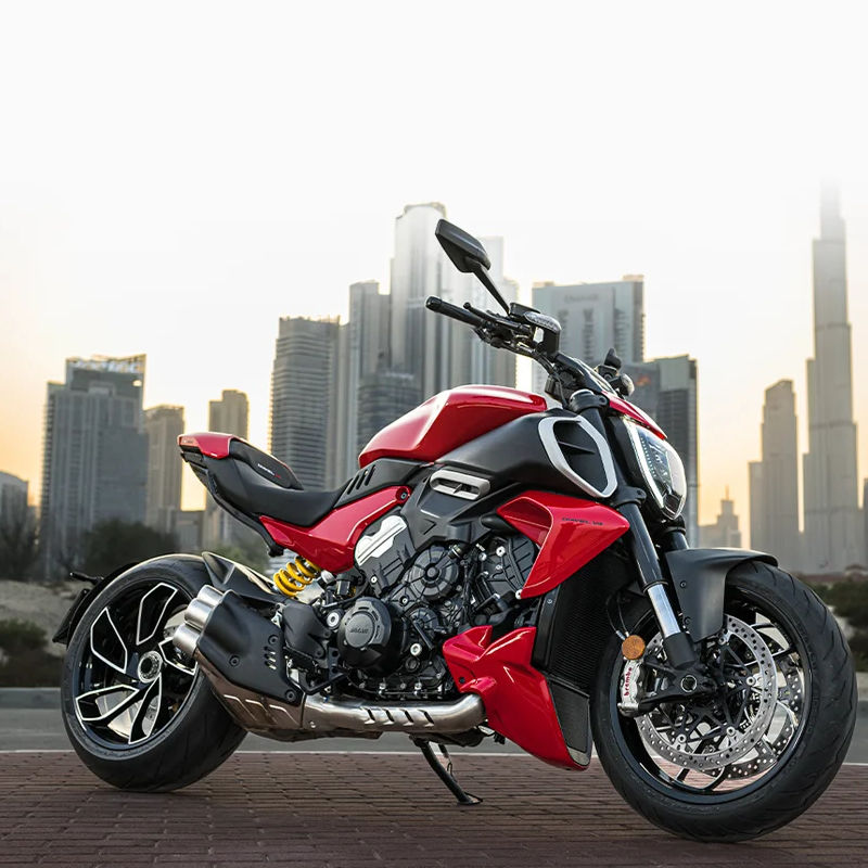 Everything To Know About The Red Hot Ducati Diavel V4 Touring Motorcycle